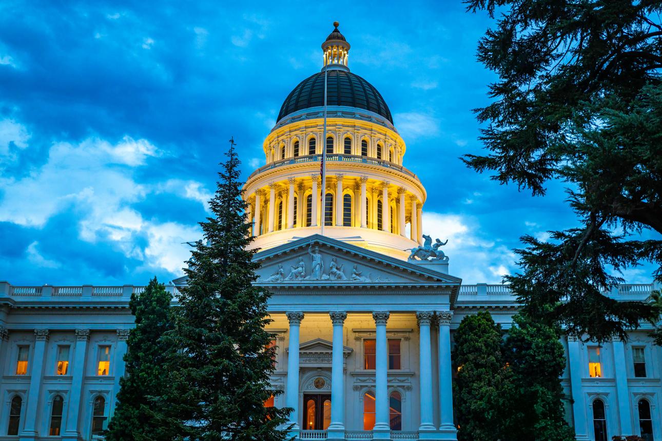 California State Capitol building in downtown Sacramento with dome and gardens