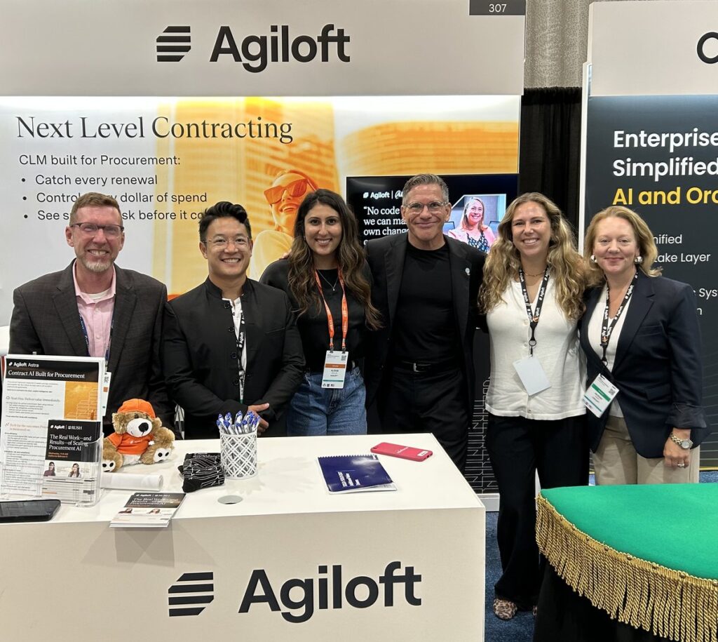 Trade show magician Zach Waldman with the Agiloft team at booth 307 at the Gaylord Pacific Resort in Chula Vista, California